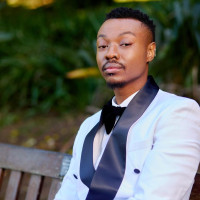 Mandisi T.